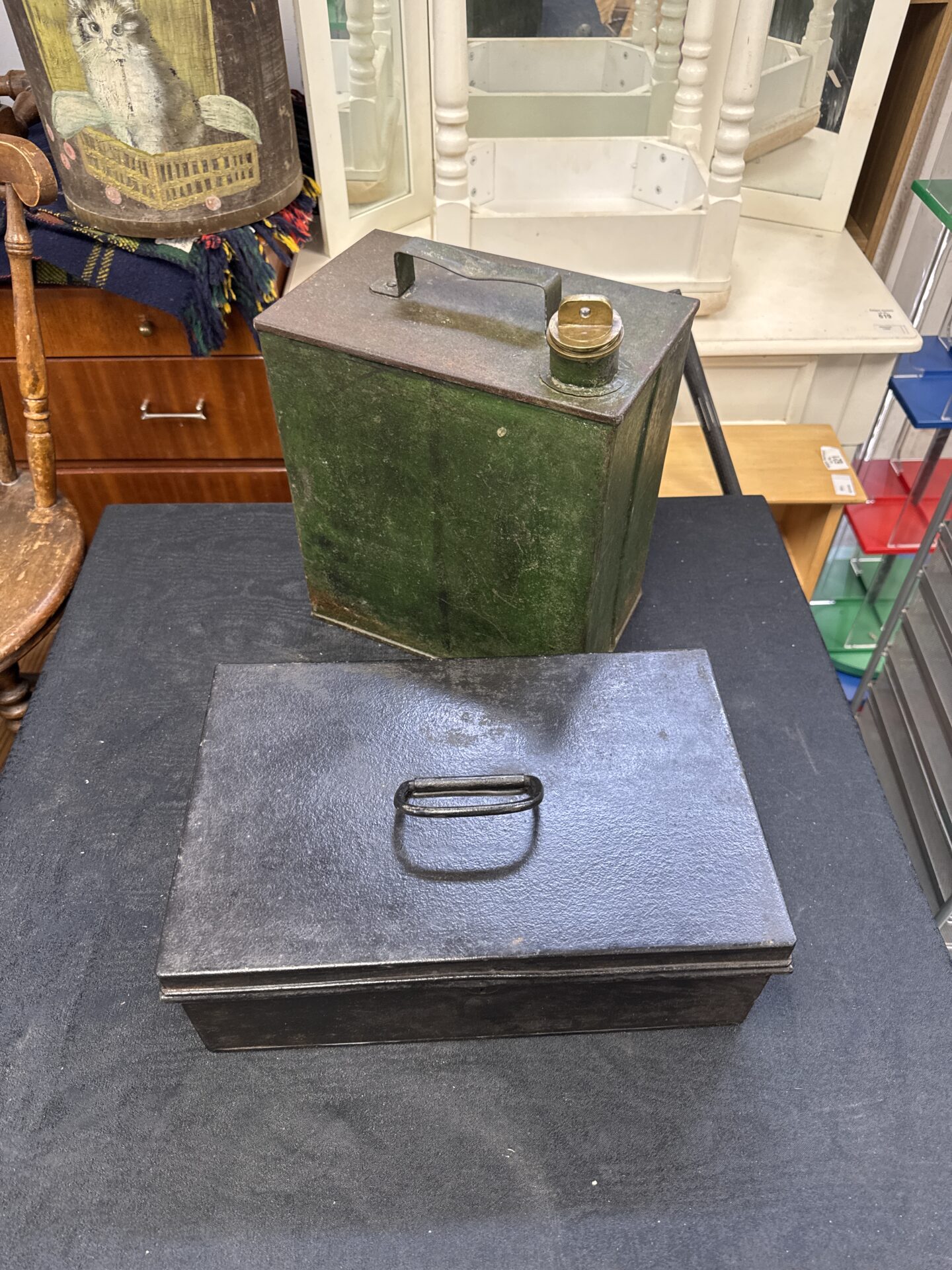 1031 Vintage metal strongbox (no key) with a fuel can