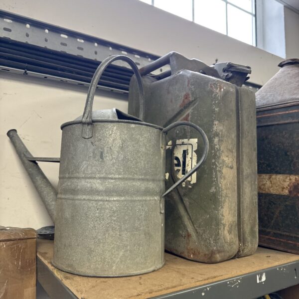 Vintage galvanised watering can and jerry can for garden use.