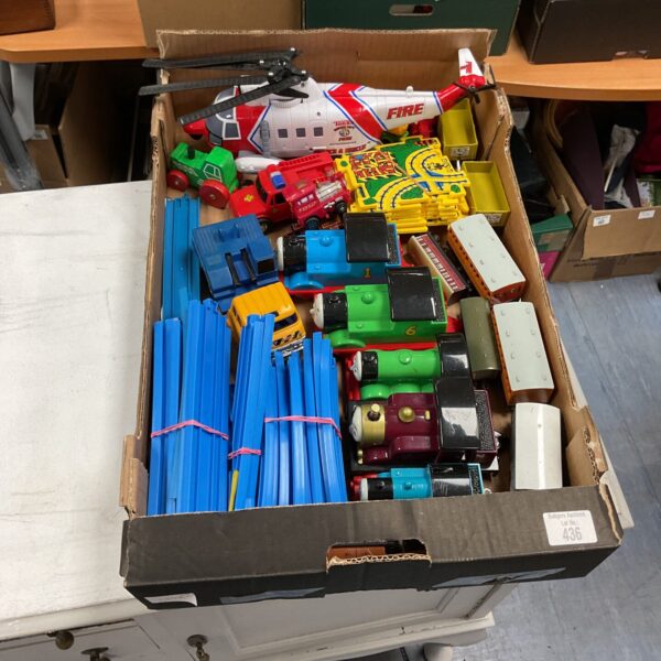Mixed toy lot featuring Thomas the Tank Engine and Tonka helicopter.