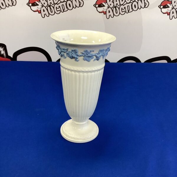 Antique Wedgwood embossed creamware vase with detailed design.