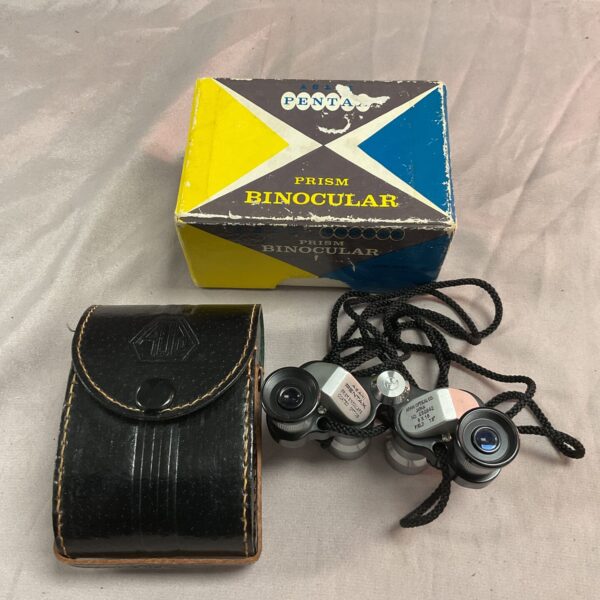 Vintage Pentax Prism 6x15 binoculars in good condition.