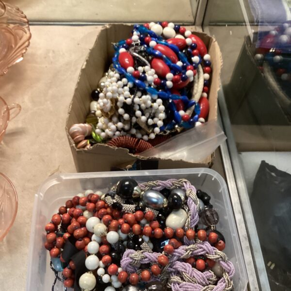 Large lot of colourful costume jewellery and bead necklaces.