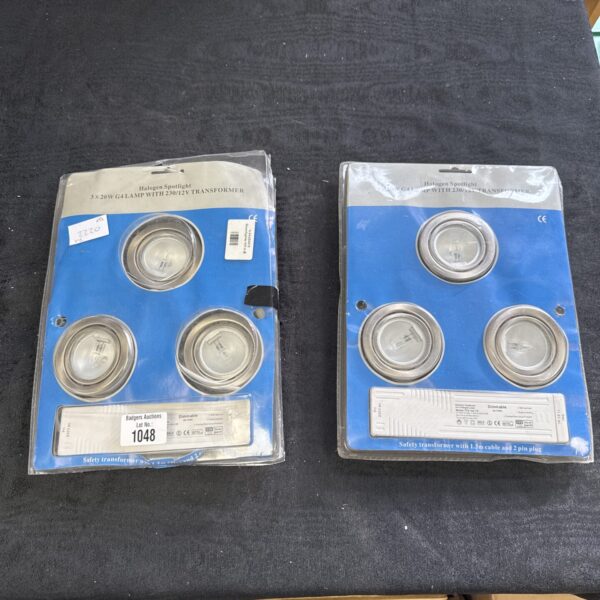 Two used halogen spotlight transformers for garden lighting.
