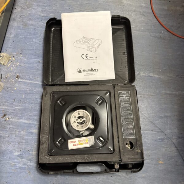 Summit camping stove, single burner, portable outdoor cooking appliance.