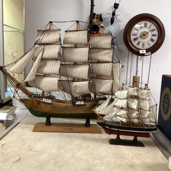 Detailed wooden model of the HMS Bounty sailing ship.
