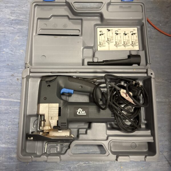 Vintage Elu jigsaw in its original carrying case, a classic power tool.