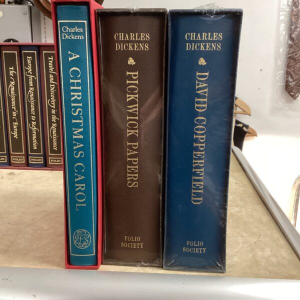 Folio Society Charles Dickens books, a collectible set of Victorian literature.