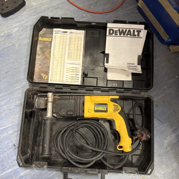 Dewalt SDS drill in original carry case, showing signs of use.