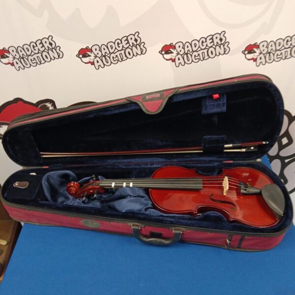 Stentor Student 2 violin in open case with bow.