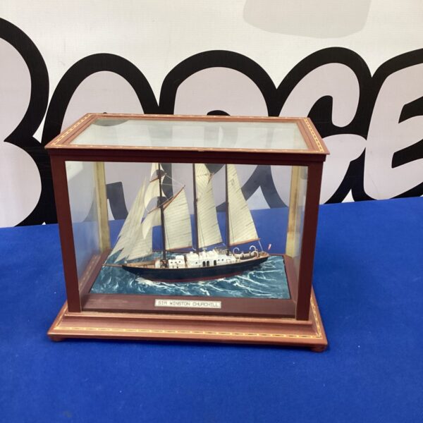 Detailed Winston Churchill model ship in a glass display case.