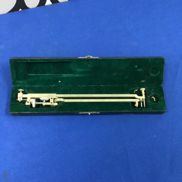 Antique brass drawing instrument, vintage drafting tool for surveying.