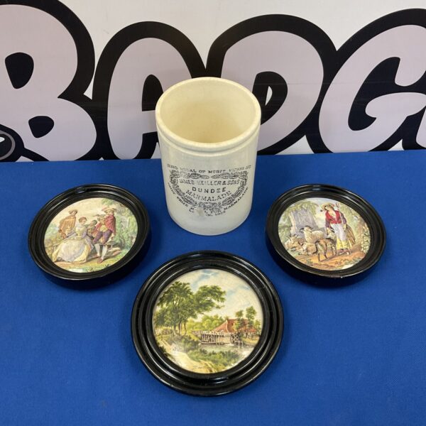 Victorian pot lids and James Keller marmalade jar on blue background