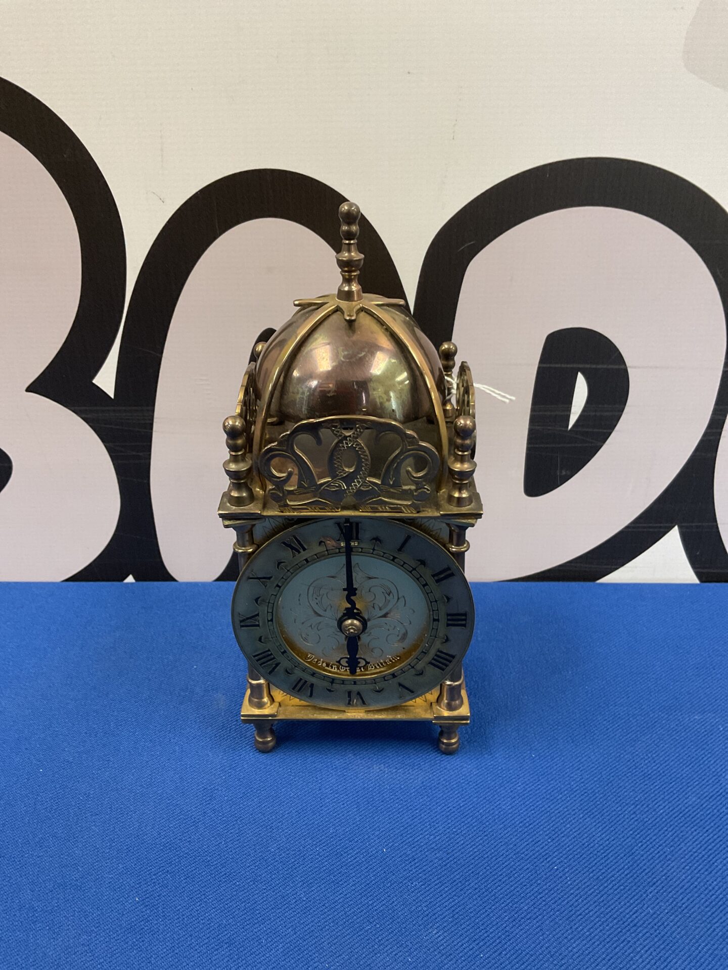 050 18th century style brass lantern clock with key