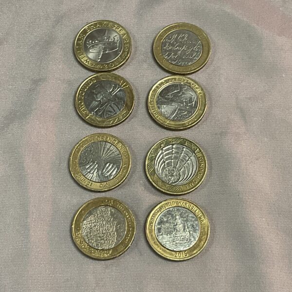 Lot of eight commemorative £2 coins for collectors.