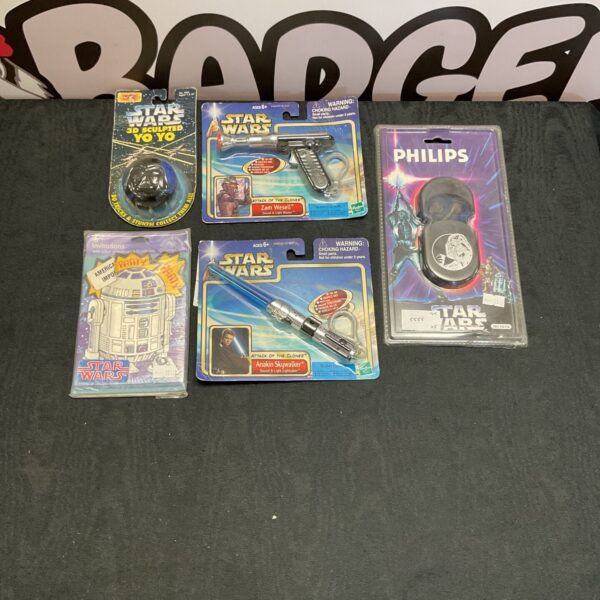 Vintage Star Wars toy lot including Philips item and yo-yo.