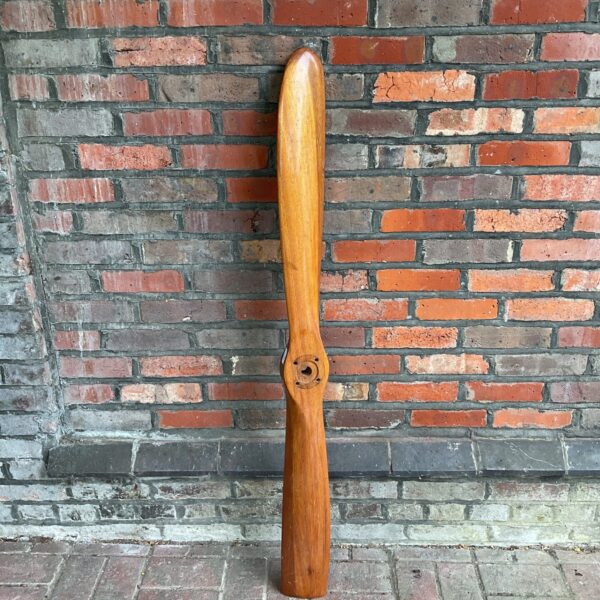 Vintage wooden propeller for microlight aircraft, detailed view.