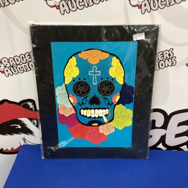 Colourful decorative skull print with floral details, Day of the Dead style.