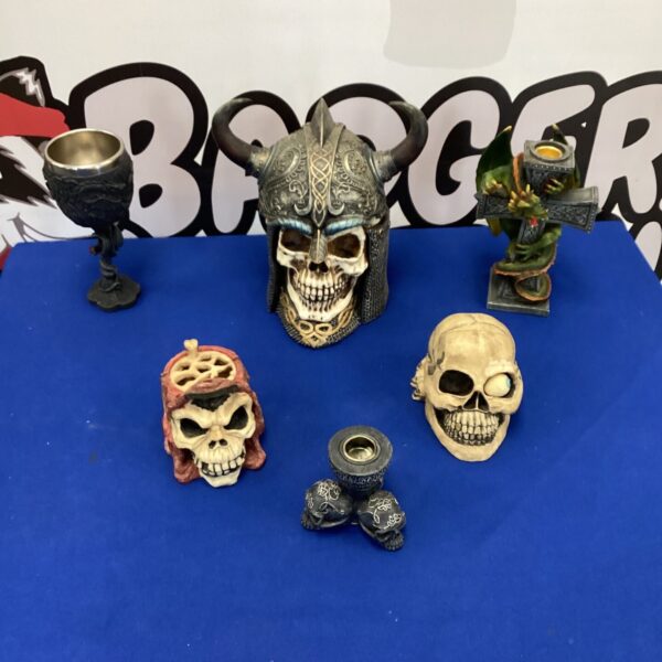 Selection of gothic skull ornaments for display and collection.