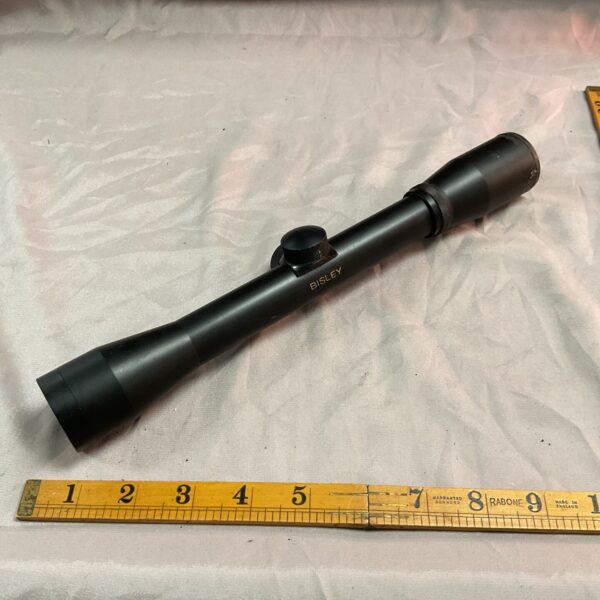 Vintage Bisley 4x32 telescope sight for firearms and shooting.