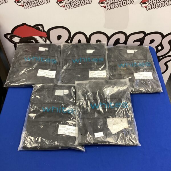 Five large black chef jackets for professional kitchen use.