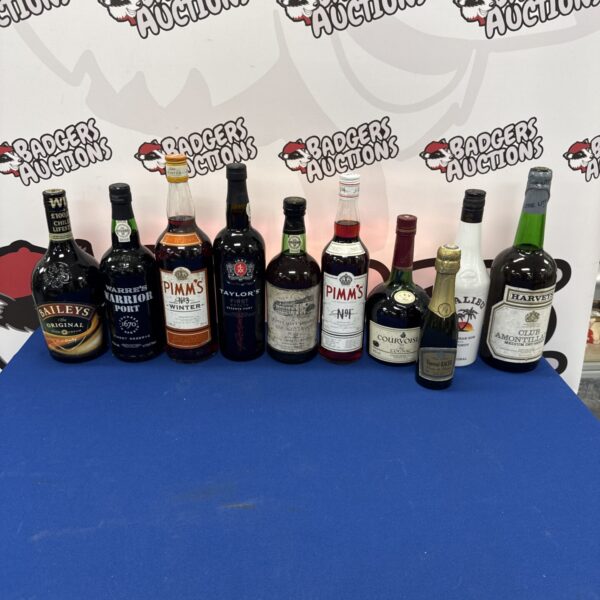 Assorted alcohol bottles including port, Baileys and Malibu in a lot.