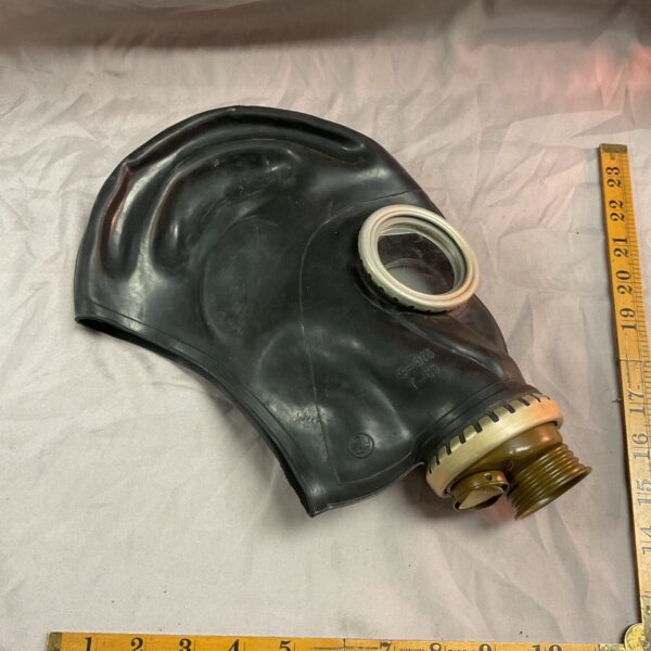 Front view of a vintage Russian PMK gas mask.