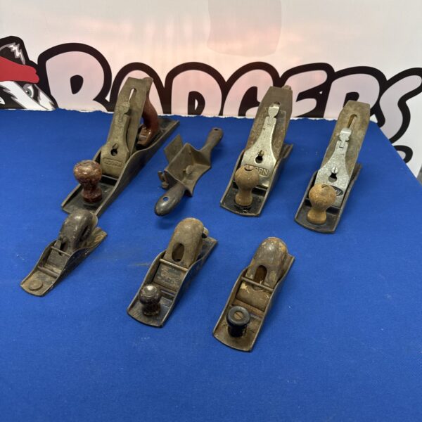 Vintage lot of woodworking planes including Record and Acorn.