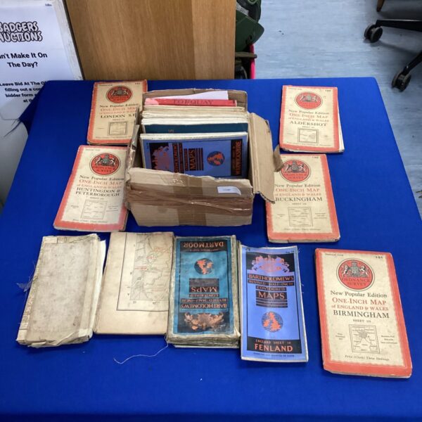 Vintage Ordnance Survey maps collection showing detailed UK topography.