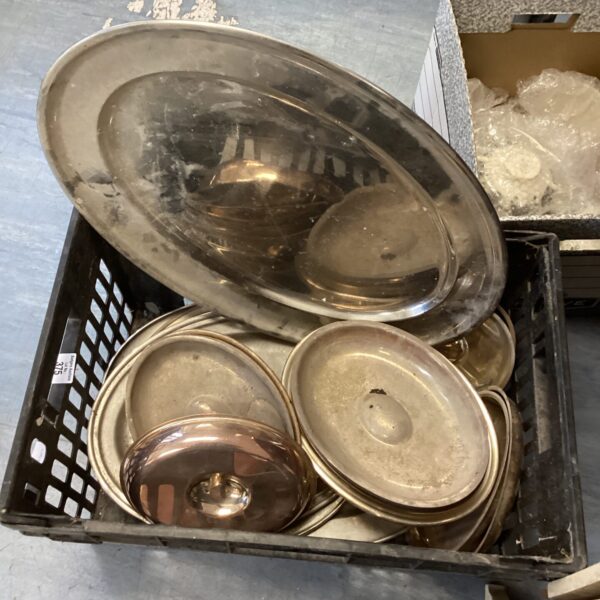 Lot of stainless steel serving dishes for catering and home use.