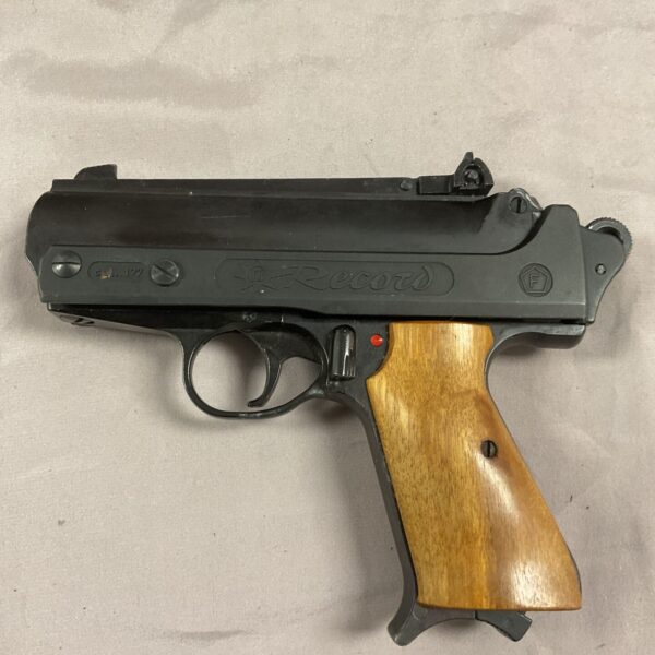 Vintage Record Jumbo 177 air pistol with wooden grip.