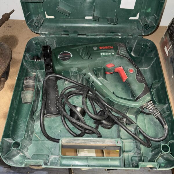 Bosch PBH 2100 RE hammer drill, a powerful electric tool.