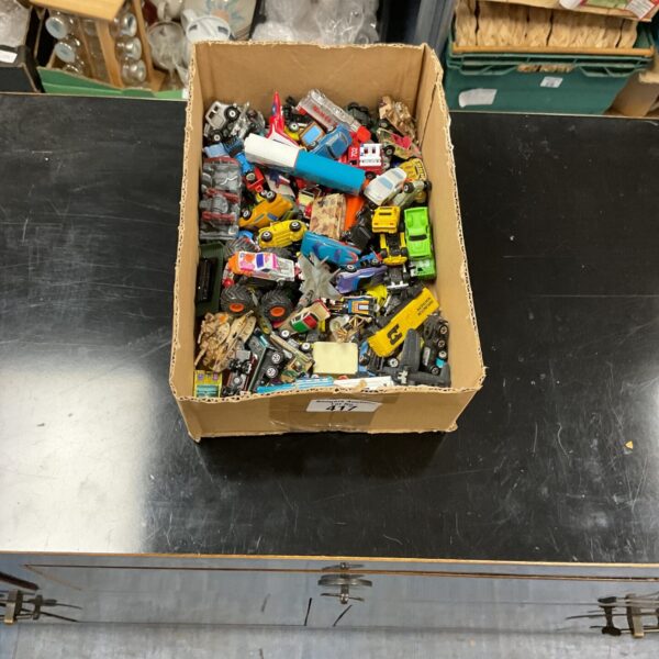 Mixed lot of micromachine vehicles and diecast toy cars.