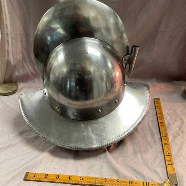 Antique Spanish morion boat helmet with broad brim.