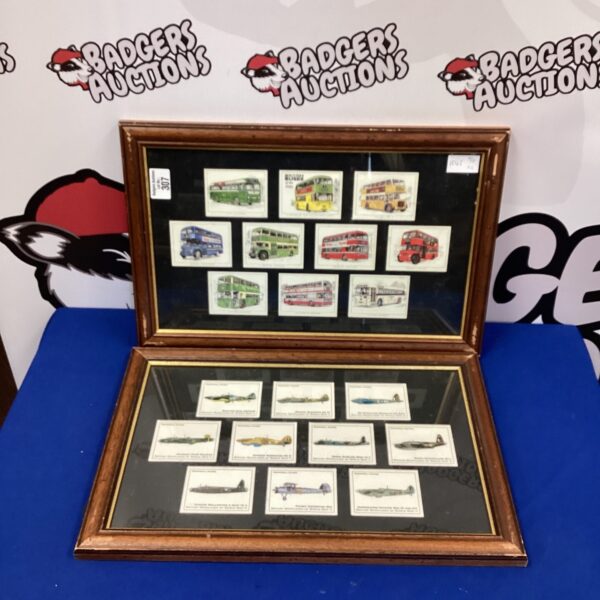 Framed vintage tea card bus pictures for collectors.