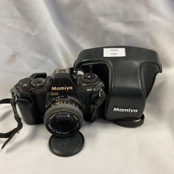 Vintage Mamiya ZM 35mm film camera with lens.