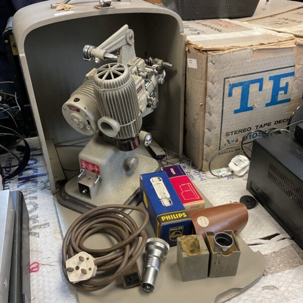 Vintage Bell & Howell 613 16mm film projector in as-is condition.
