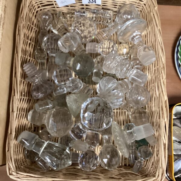 Lot of clear glass decanter stoppers for vintage barware.
