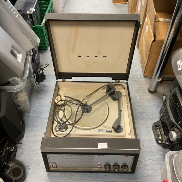 Vintage Bush record player with BSR turntable, side view.