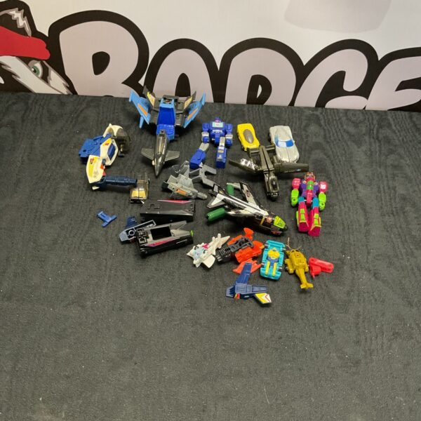 Vintage Transformer toy lot from the 1980s, collectible action figures.