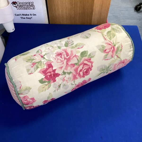 Vibrant floral patterned cushion for home decor.