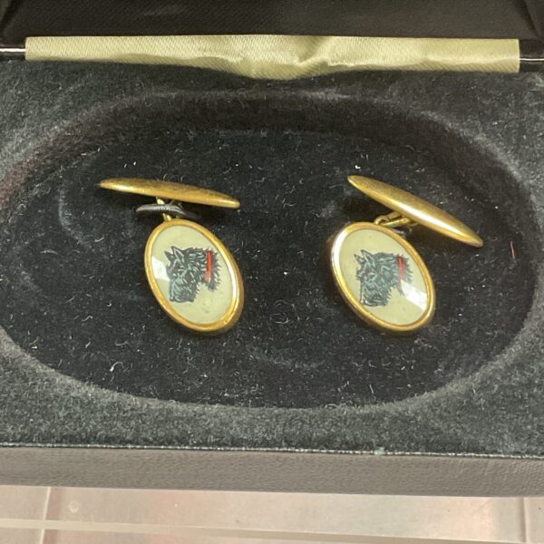 Vintage gilt Scottie dog cufflinks, a charming men's accessory.