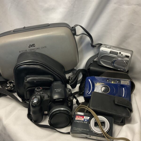 Fujifilm S5500 digital camera with case and accessories.