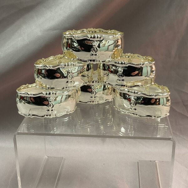 Silver plate set of six teddy bear napkin rings.