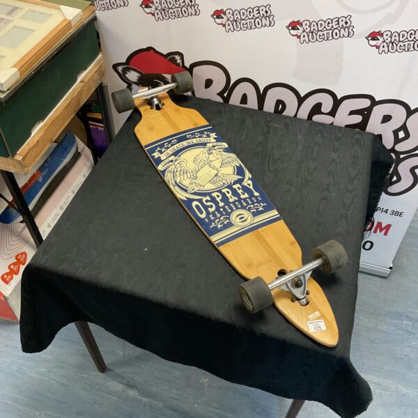 Vintage Osprey skateboard cruiser with eagle design.