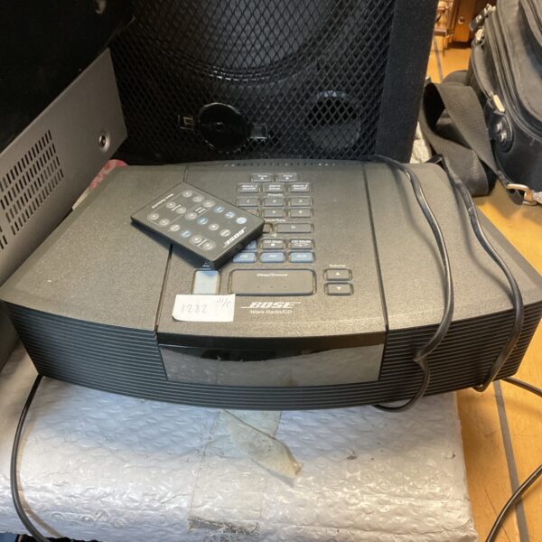 Vintage Bose Wave Radio CD system with remote control.