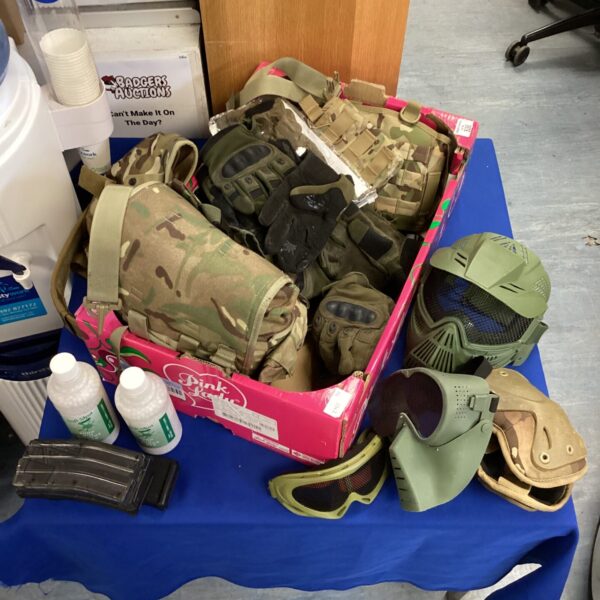 Airsoft gear bundle including mask, gloves and BBs.