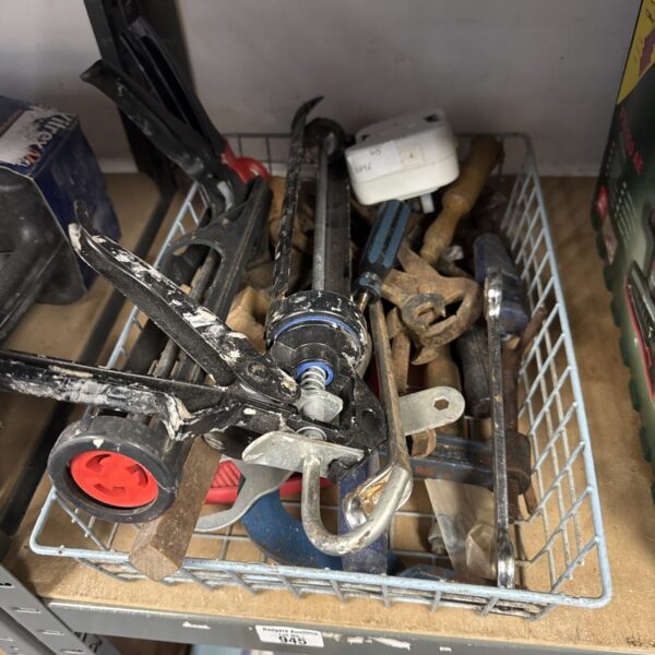 Tray of assorted vintage hand tools for DIY projects.