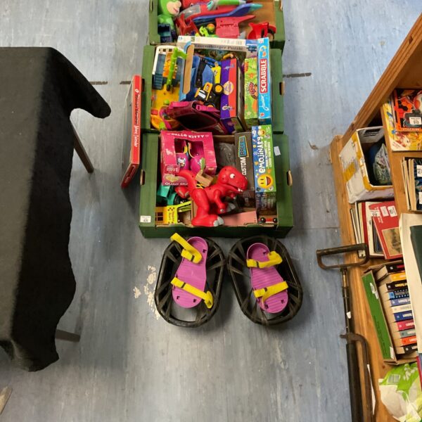 Mixed toy lot featuring PJ Masks figures and board games.