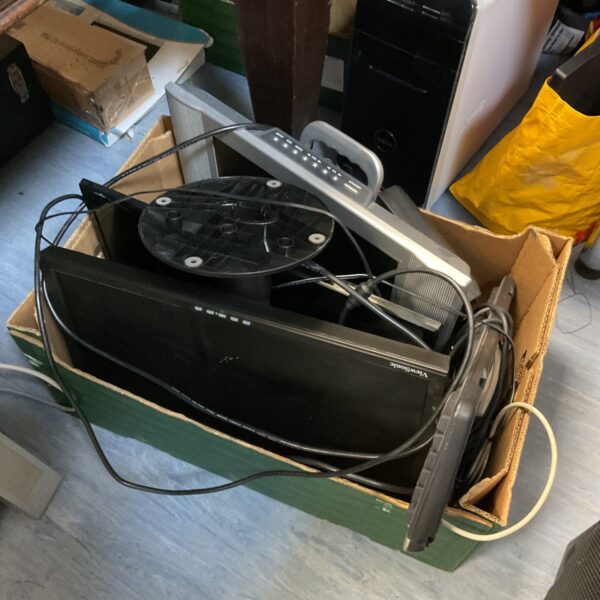 Vintage computer monitors and keyboards in a mixed lot.