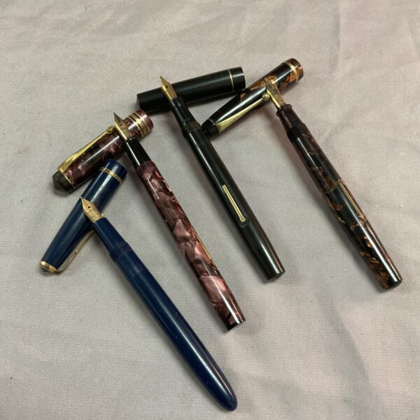 Vintage fountain pen lot with Conway Stewart and gold nibs.